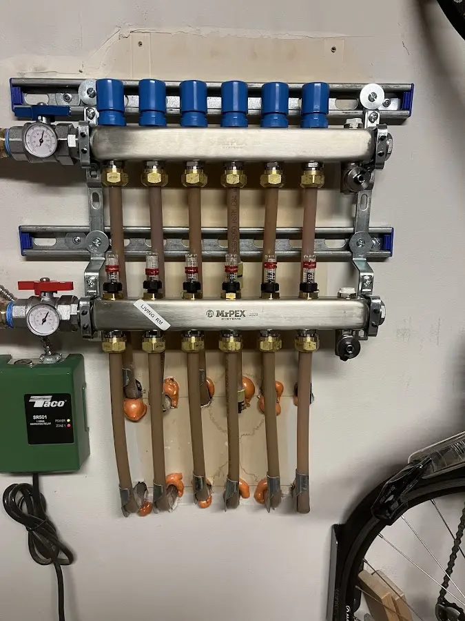 Plumber performing Water Heater Repair at a residential property in Mullins